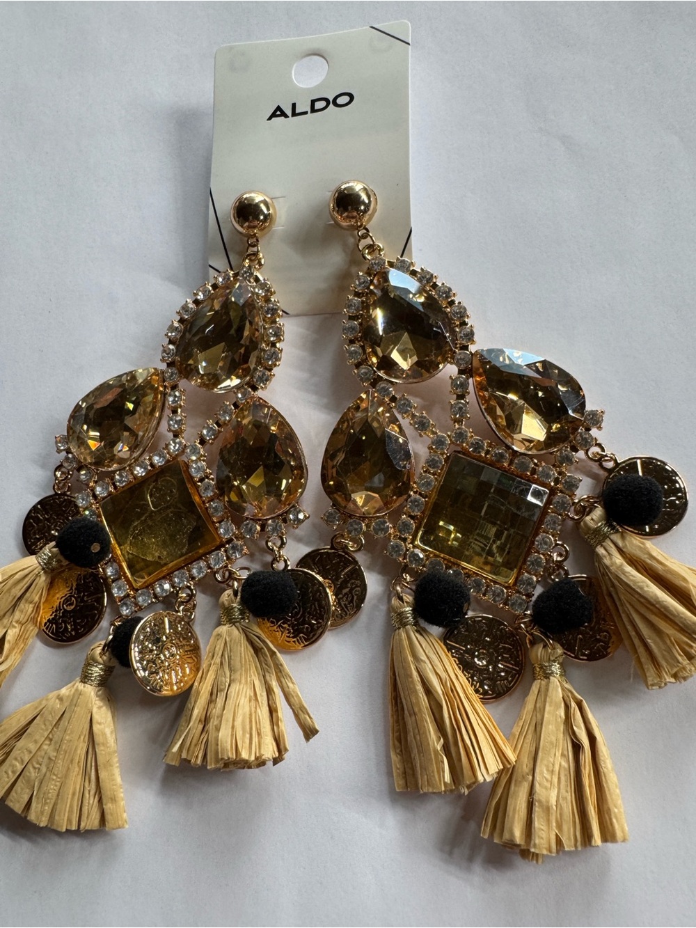 ALDO Gold and Cream Tassel Chandelier Earrings with Black Pom Accents